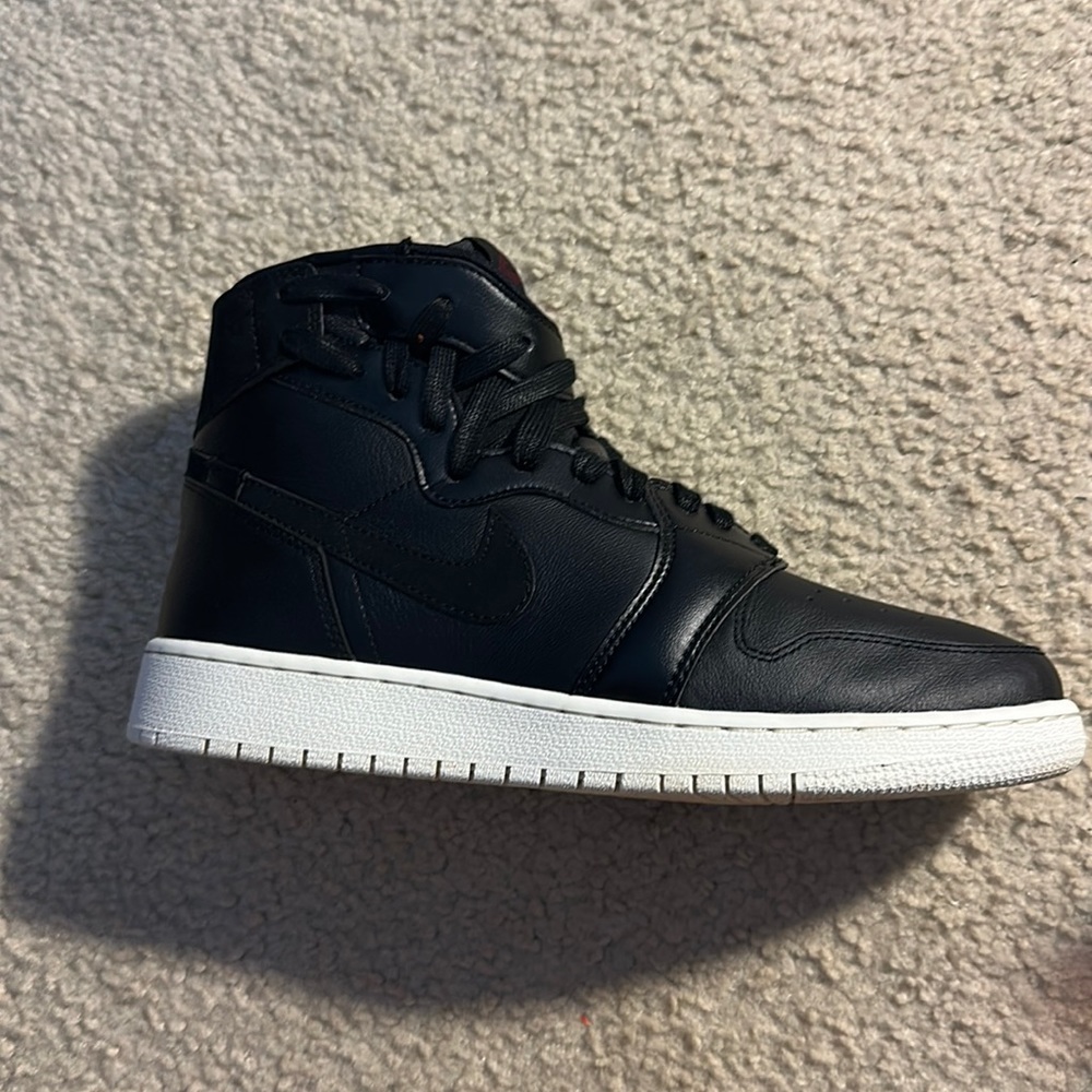 Black and white mid Jordan’s.